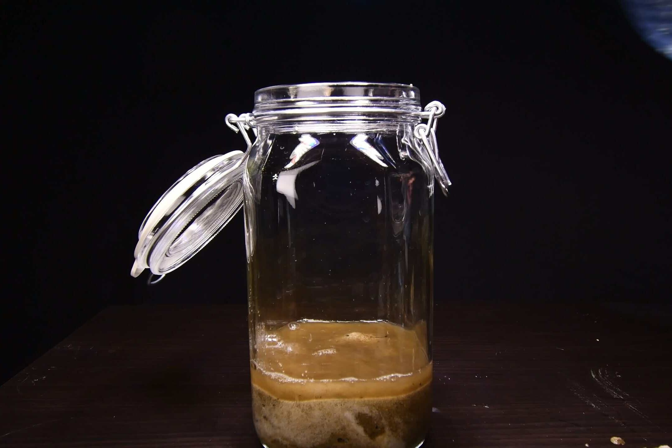 Adding river water to the glass jar ecosphere
